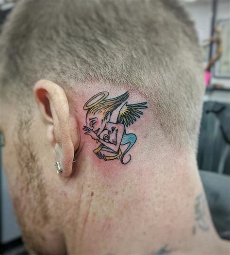 angel whispering in ear neck tattoo|Angel Whispering In Ear Tattoo Meaning: A。